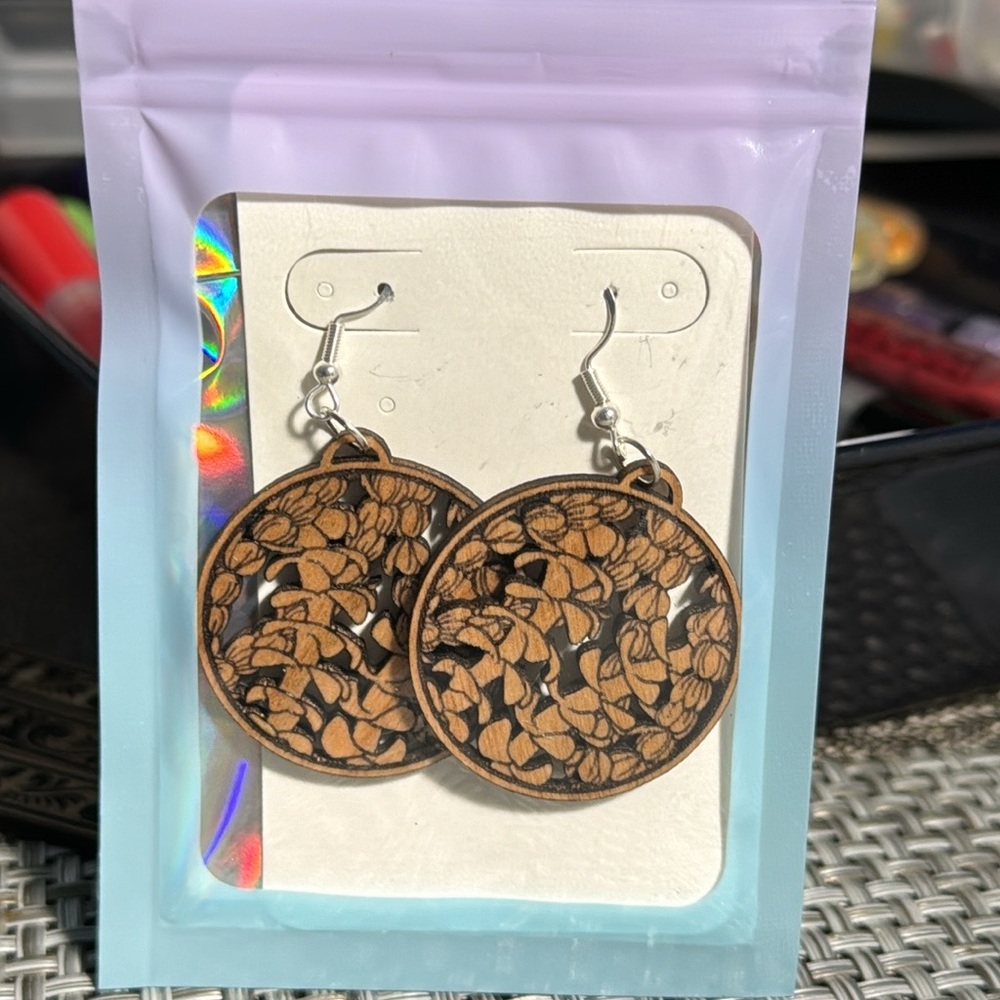 Handmade Hawaiian Pikake and Puakenikeni Lei earrings laser cut and engraved